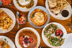 breakfast table full of different dishes